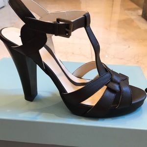 Strappy sandal heels with 1/2” platform.